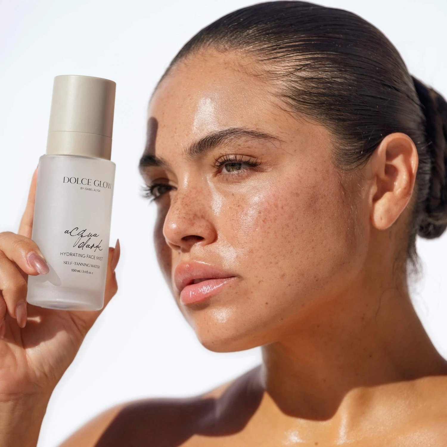 https://d3vlxf0ngetfml.cloudfront.net/blog-media/original_images/Dolce_Glow_Acqua_Dark_Hydrating_Self-Tanning_Face_Mist.webp
