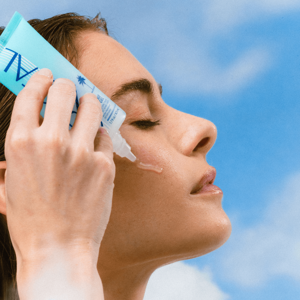 https://d3vlxf0ngetfml.cloudfront.net/compressed/blog-media/original_images/Vacation_CrystalGel_ModelApplyingToCheek-CloudBG_2000x2000_Custom.png
